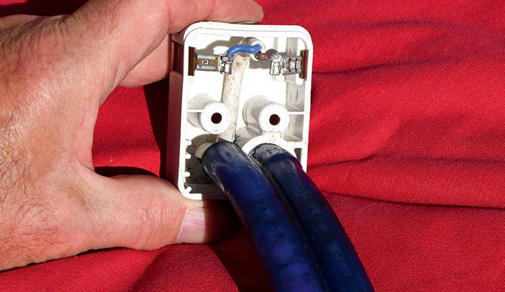 Inside connector showing spade connectors. Note the polarity