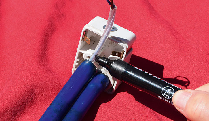 Push new cable through guide tube; mark where it emerges. Make sure the pump outlet is fully engaged with the hose