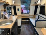 Parallel seating and front window in Bailey Discovery D4-4L