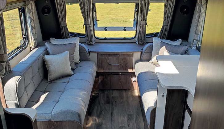 Lounge settees and large windows in Coachman Laser 665