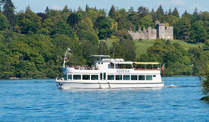 Island Discovery sailing past Balloch Castle
