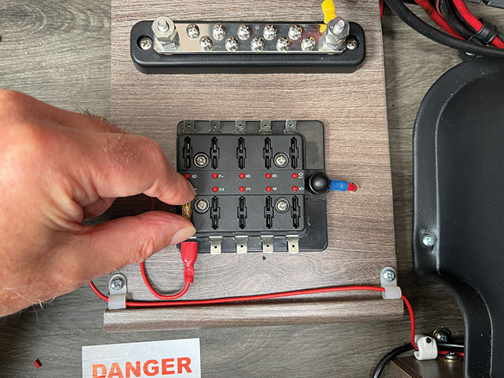 Making connections at power unit and inserting fuse