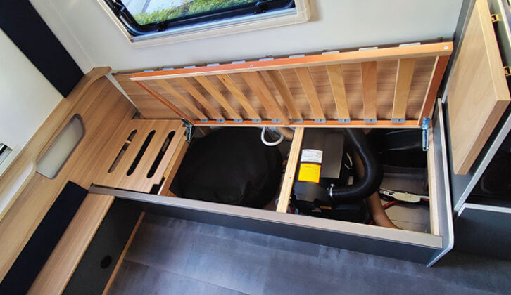 Underseat locker with heater