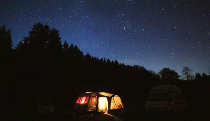 Caravan under night sky