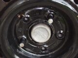 Wheel after bolts removed