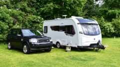 Caravan and tow car pitched up