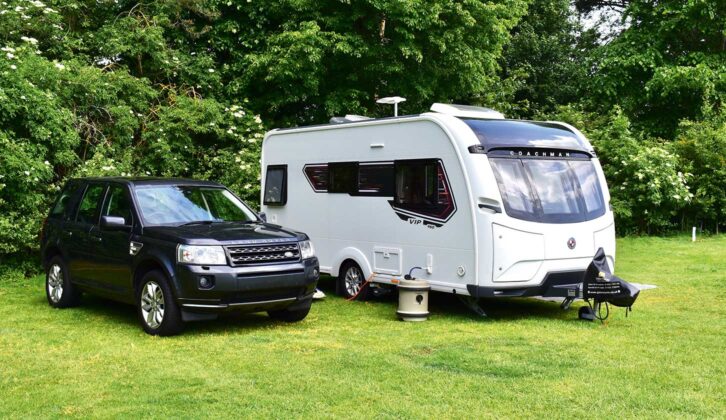 Caravan and tow car pitched up