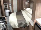 Fixed bed retracted