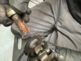 Applying copper slip to starwheel adjuster