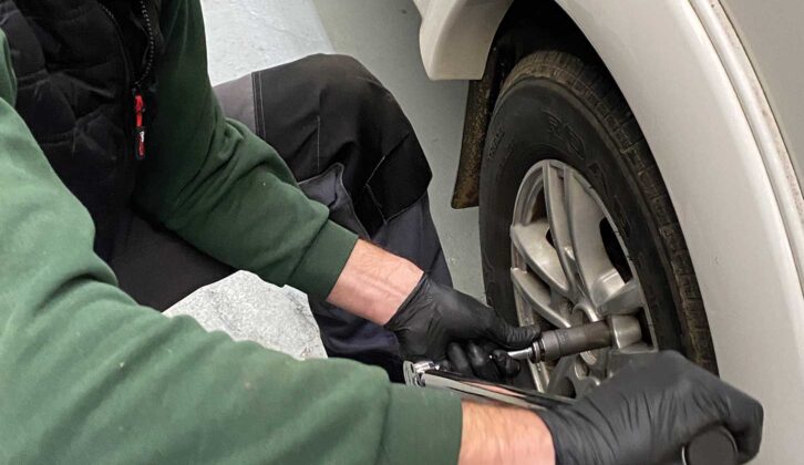 Threading then torquing wheel nuts
