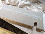 Plywood floor with notch for gas pipe