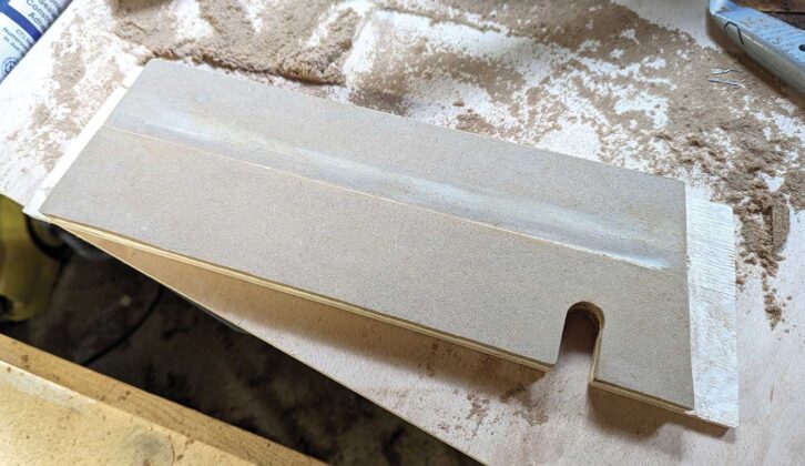 Plywood floor with notch for gas pipe