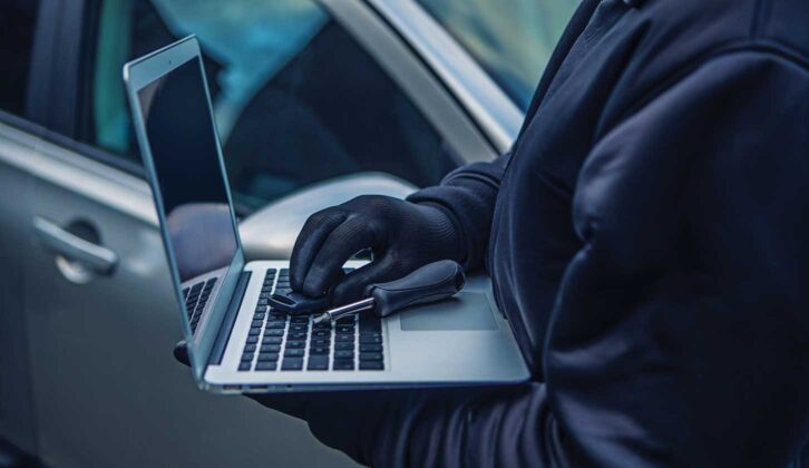 A thief on a laptop