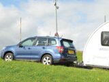 A Forester pulling a caravan up a hill