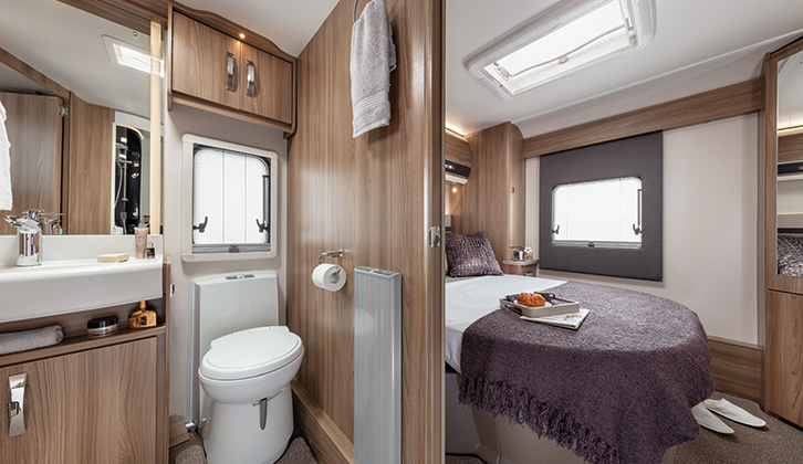 A caravan with a transverse island bed, central washroom layout
