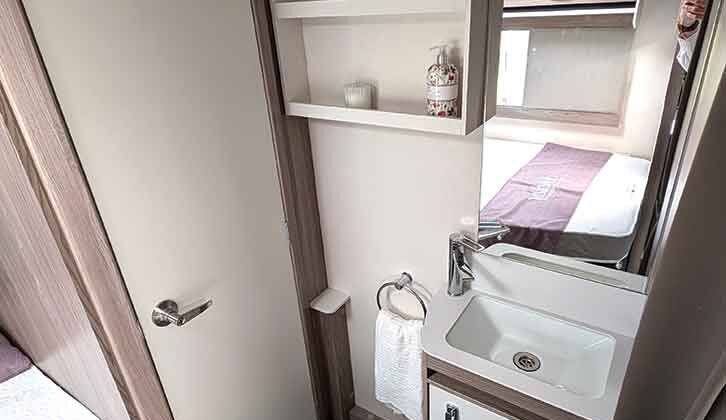 The handbasin, set outside the washroom