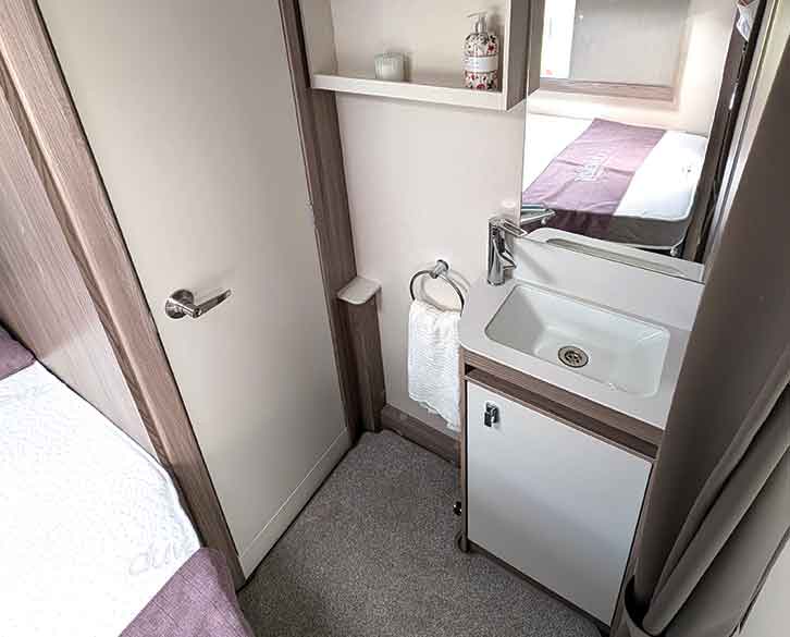 The handbasin, set outside the washroom