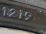 A tyre with the number '12 19'
