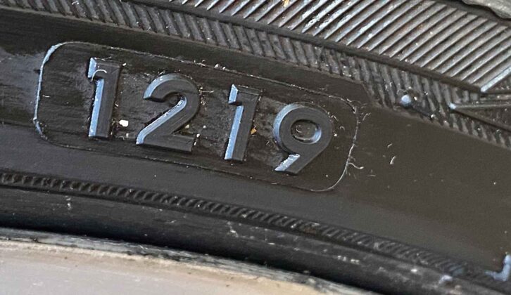 A tyre with the number '12 19'