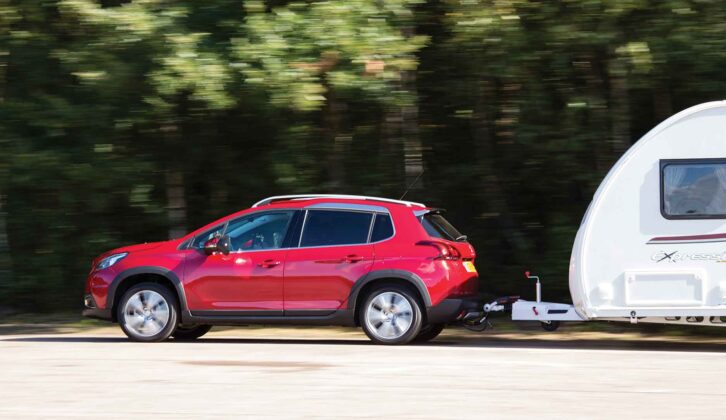 The car towing a caravan