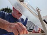 Wiping down the extra sealant