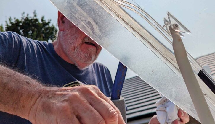 Wiping down the extra sealant