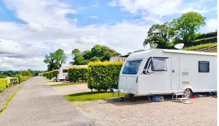 A caravan pitched up at Parkers Farm Holiday Park