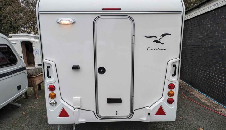 The rear of the tourer has plastic grab handles