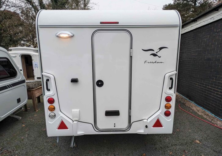 The rear of the tourer has plastic grab handles