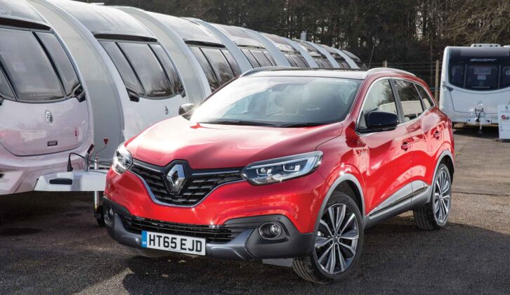 The Renault Kadjar parked in front of a row of caravans