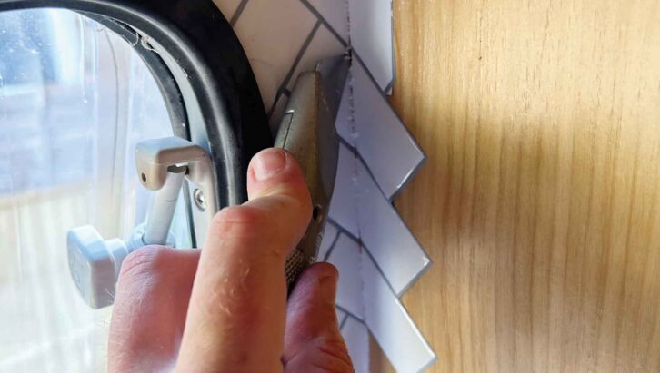 Trimming the excess with a knife