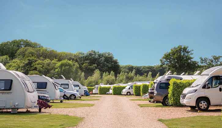 Vans pitched up at South Lytchett Manor