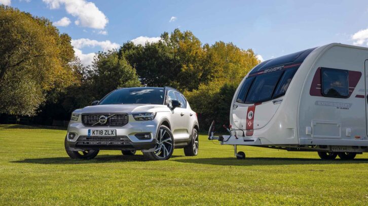 A used Volvo XC40 hitched up to a caravan