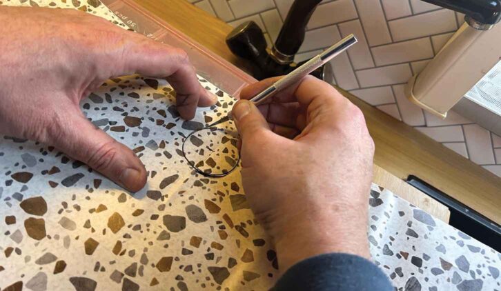 Marking the cut-out for the tap was tricky.