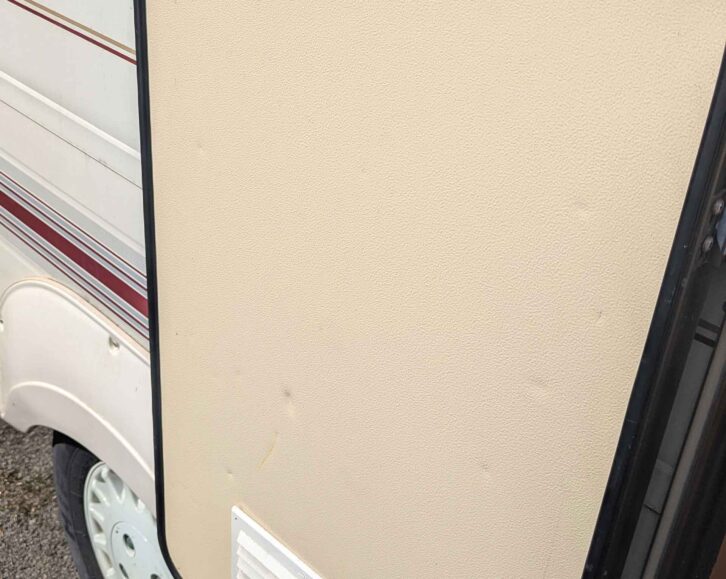 The caravan door as it was before