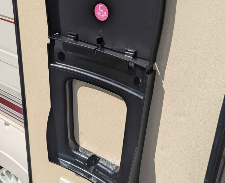 Getting the mounting of the door bin in position