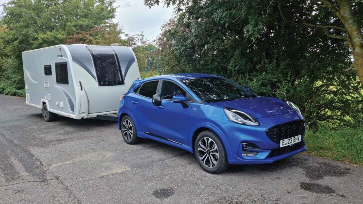 A Ford Puma towing a caravan