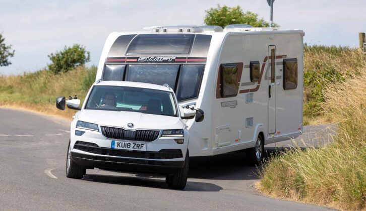 A Skoda Karoq towing a caravan