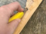 Trimming excess with a sharp knife
