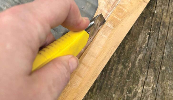 Trimming excess with a sharp knife