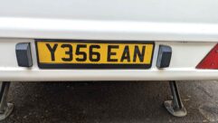 The number plate and plinth in use