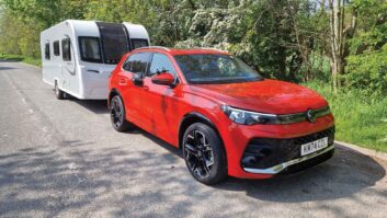 The VW Tiguan 2.0 TSI 265PS R-Line 4Motion hitched up to a caravan