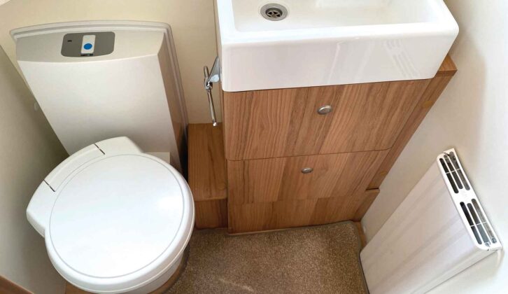 The cassette toilet and the basin in the washroom