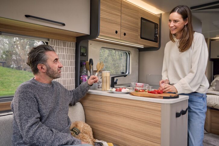 Couple in kitchen of Bailey Pegasus Black Edition