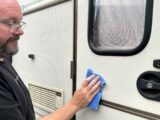 Nigel Donnelly in the act of polishing a caravan