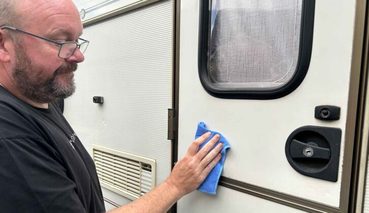 Nigel Donnelly in the act of polishing a caravan