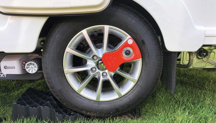 A caravan wheel with an Al-Ko wheel clamp in place