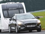 A Ford Focus Estate towing a caravan