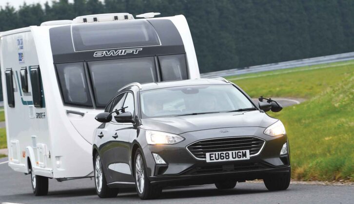 A Ford Focus Estate towing a caravan