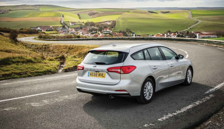 The Estate parked up with a scenic view in the background